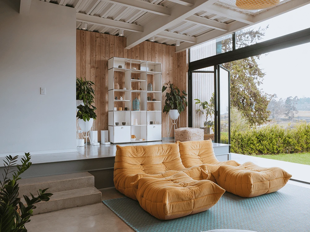 Una casa dai molti mondi a Medellín: design modulare, natura e arredi USM Haller nelle colline di Alto de Las Palmas